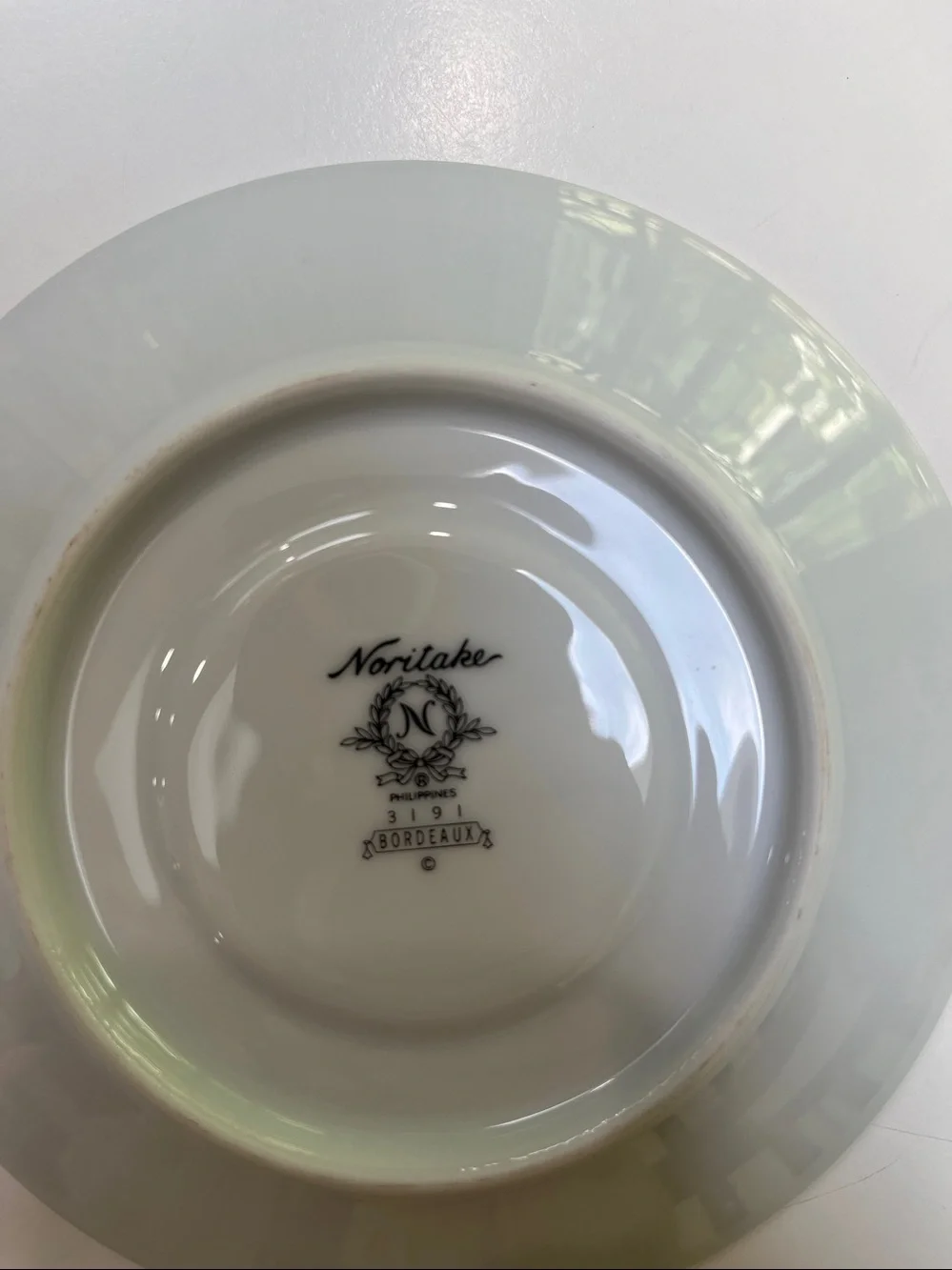 12 Noritake Bordeaux floral design saucers. Vintage, retired pattern.